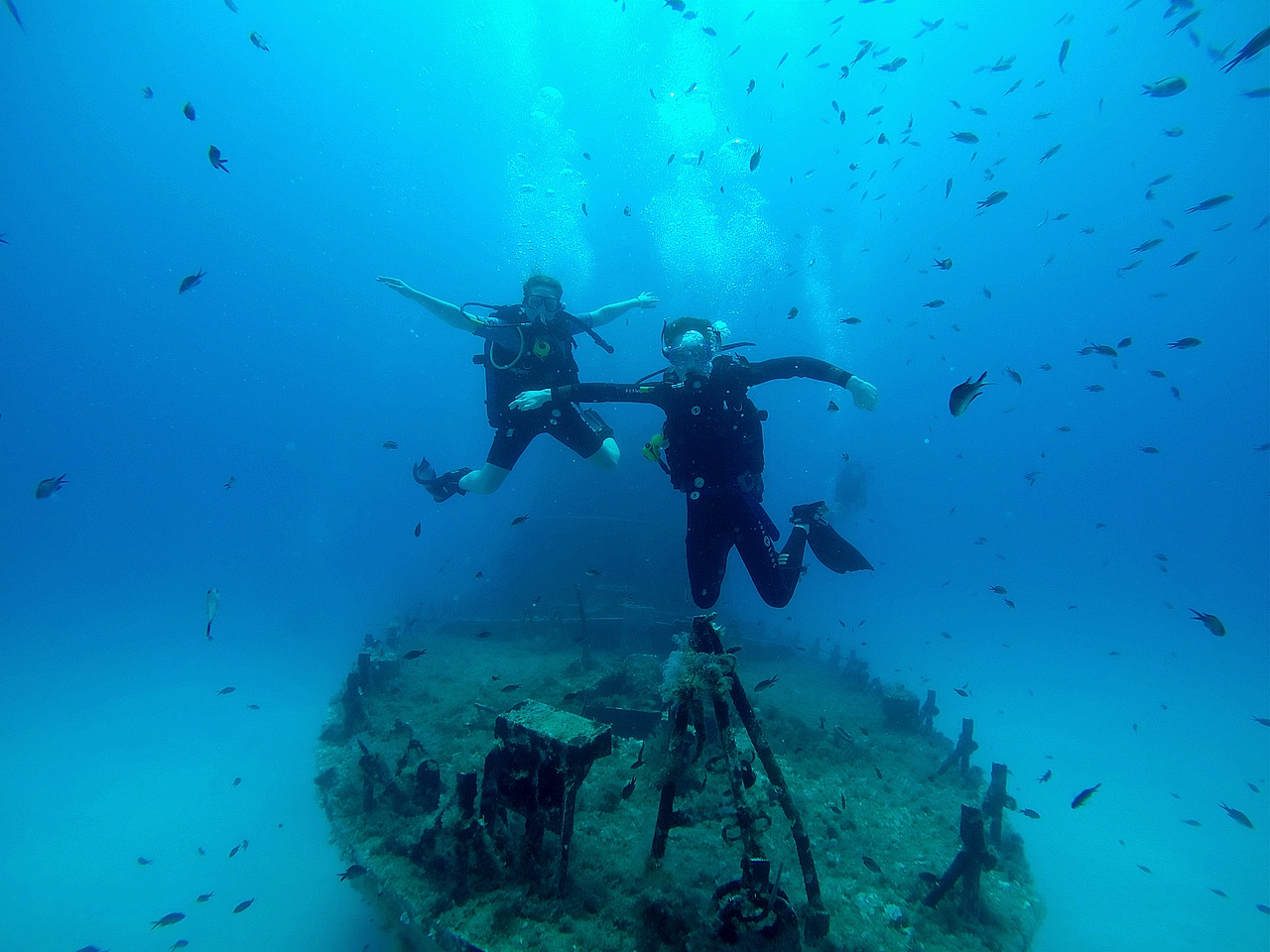 teens under water on the shipwreck
